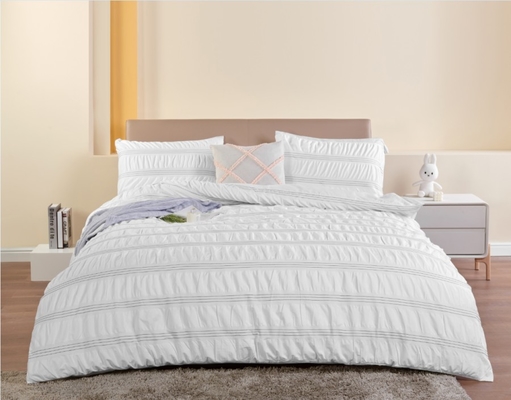 Το Seersucker Cotton ανακυκλωμένο πολυεστέρας ντουέτο σετ βιώσιμη λευκή ντουέτο κάλυψη βασιλιά